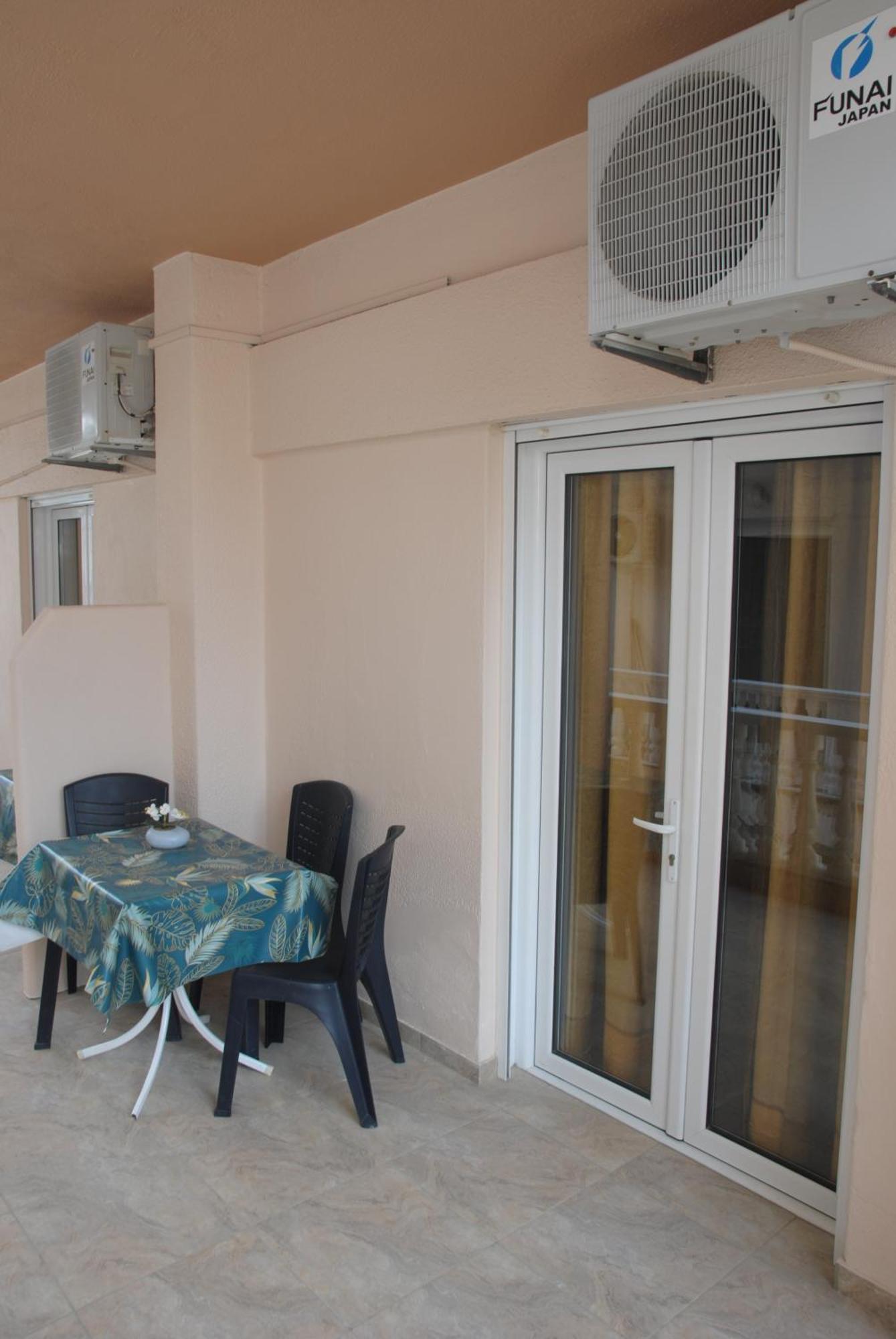 Light Blue Paralia Apartments Exterior photo